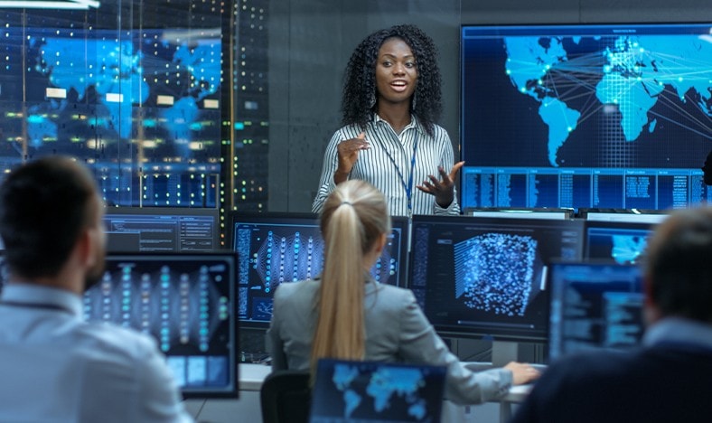 Data center team discusses operations.
