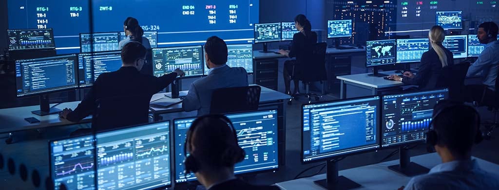 IT engineers in the control room of a data center run generative AI systems.