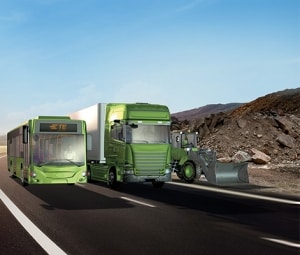 A CAD drawing showing three types of electric heavy-duty vehicles as indicated by the green color of the vehicles.