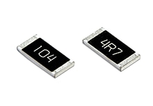 Two precision and power SMD resistors on a white background