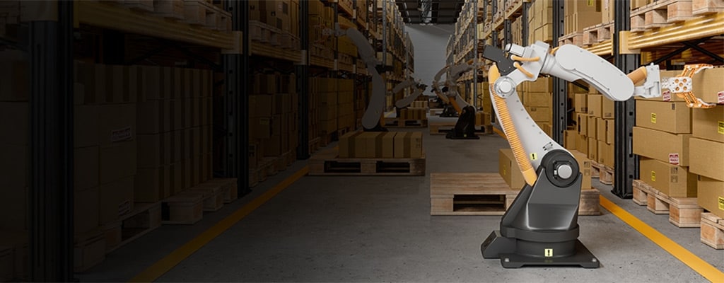 An AMR robot arranging cardboard boxes in a warehouse 